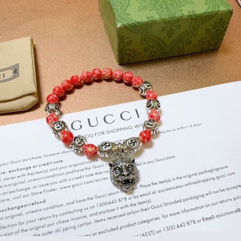 G*u*i bracelets
